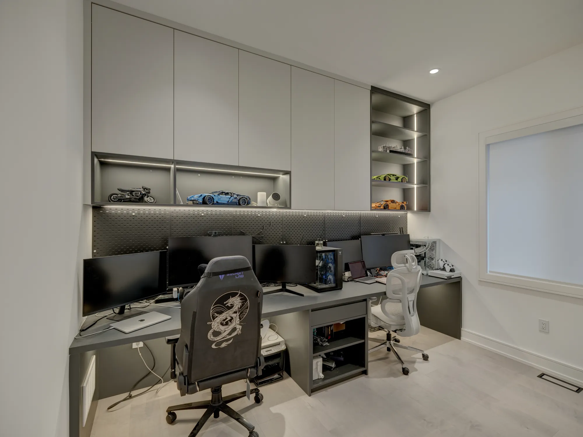 Two-person home office built-in desk wall with upper cabinets in Richmond Hill